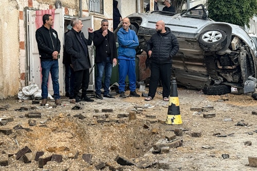 In Pictures: Iranian missile hits Arab city in central Israel