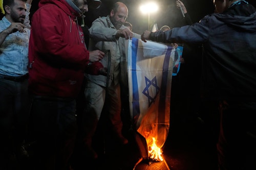 Pro-government demonstrators in Tehran hold rally after US-Iran truce announcement